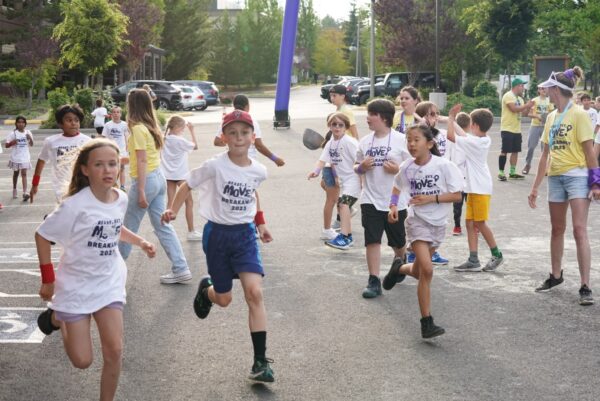 Kids running and playing at summer VBS
